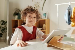 A child using an iPad.