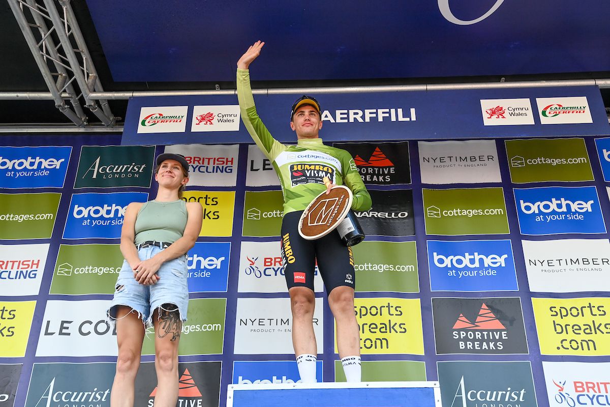 Picture by Simon Wilkinson/SWpix.com - 10/09/2023 - Cycling - 2023 Tour of Britain - Stage 8: Margam Country Park to Caerphilly (166.8km) - Olav Kooij of Team Jumbo Visma (Wearing the cottages.com Points Jersey) on the podium taking the victory in the Cottages.com Points classification