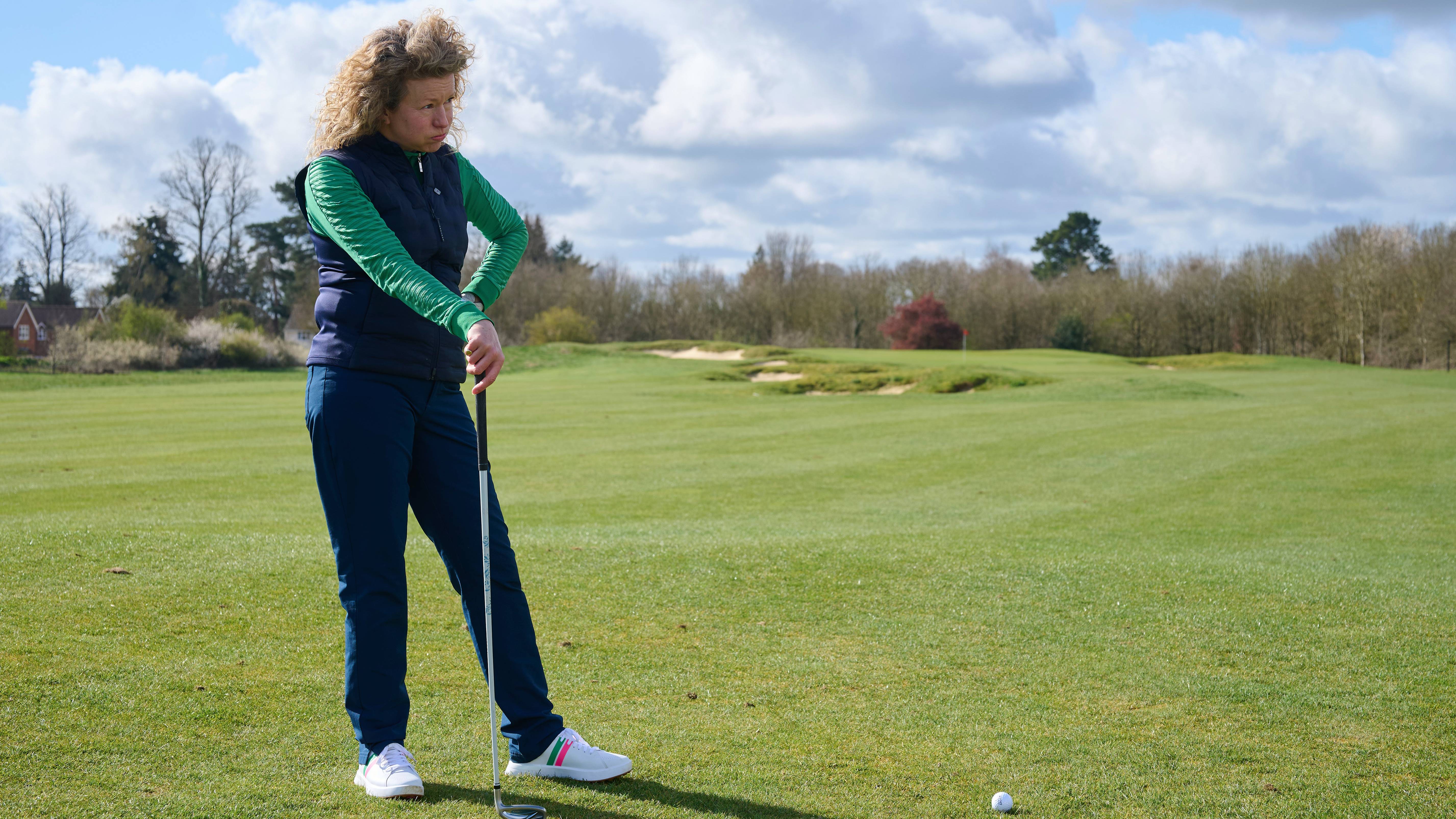 Katie Dawkins on the fairway feeling miserable