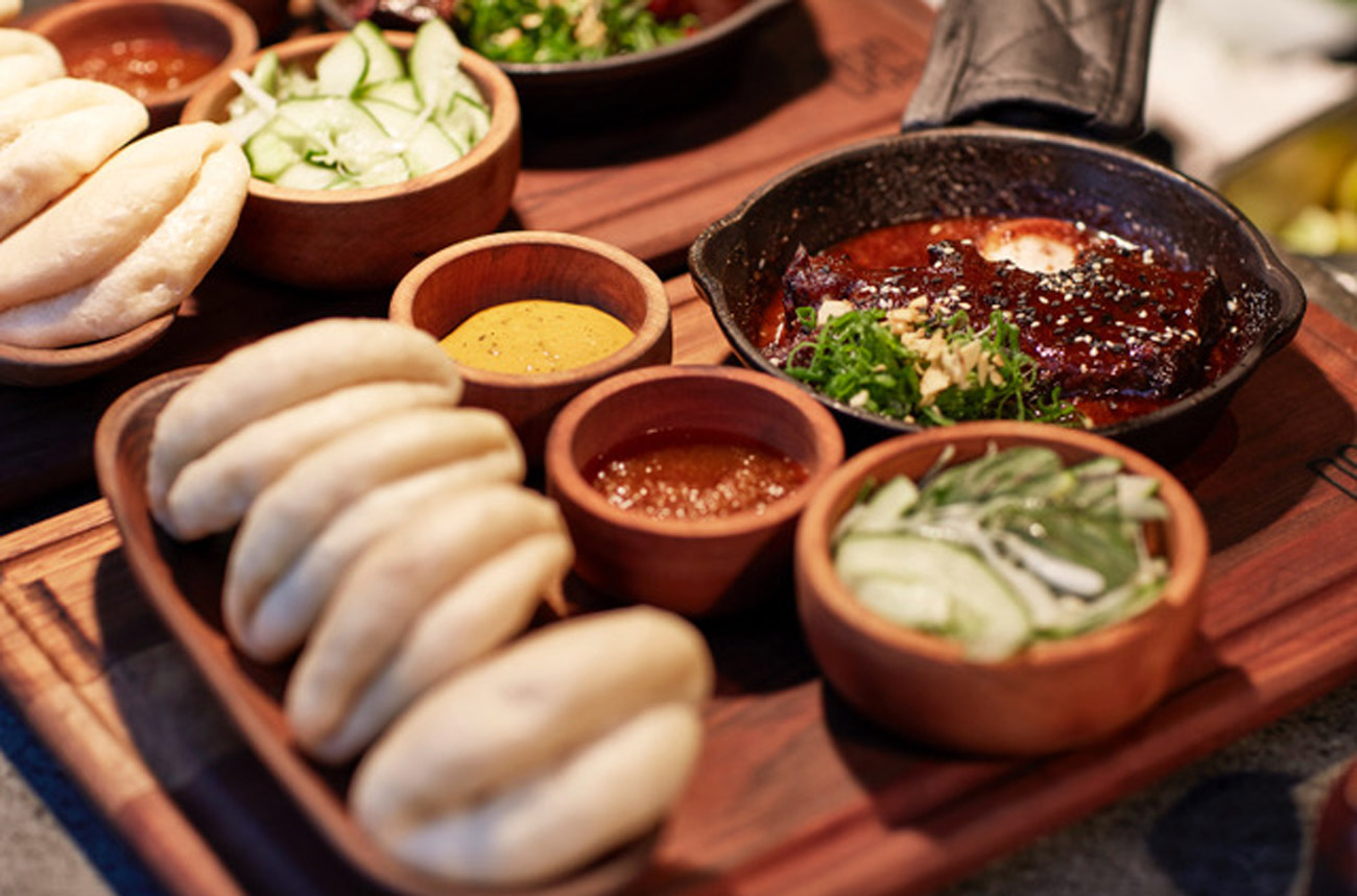 A selection of Japanese dishes in small bowls on a table