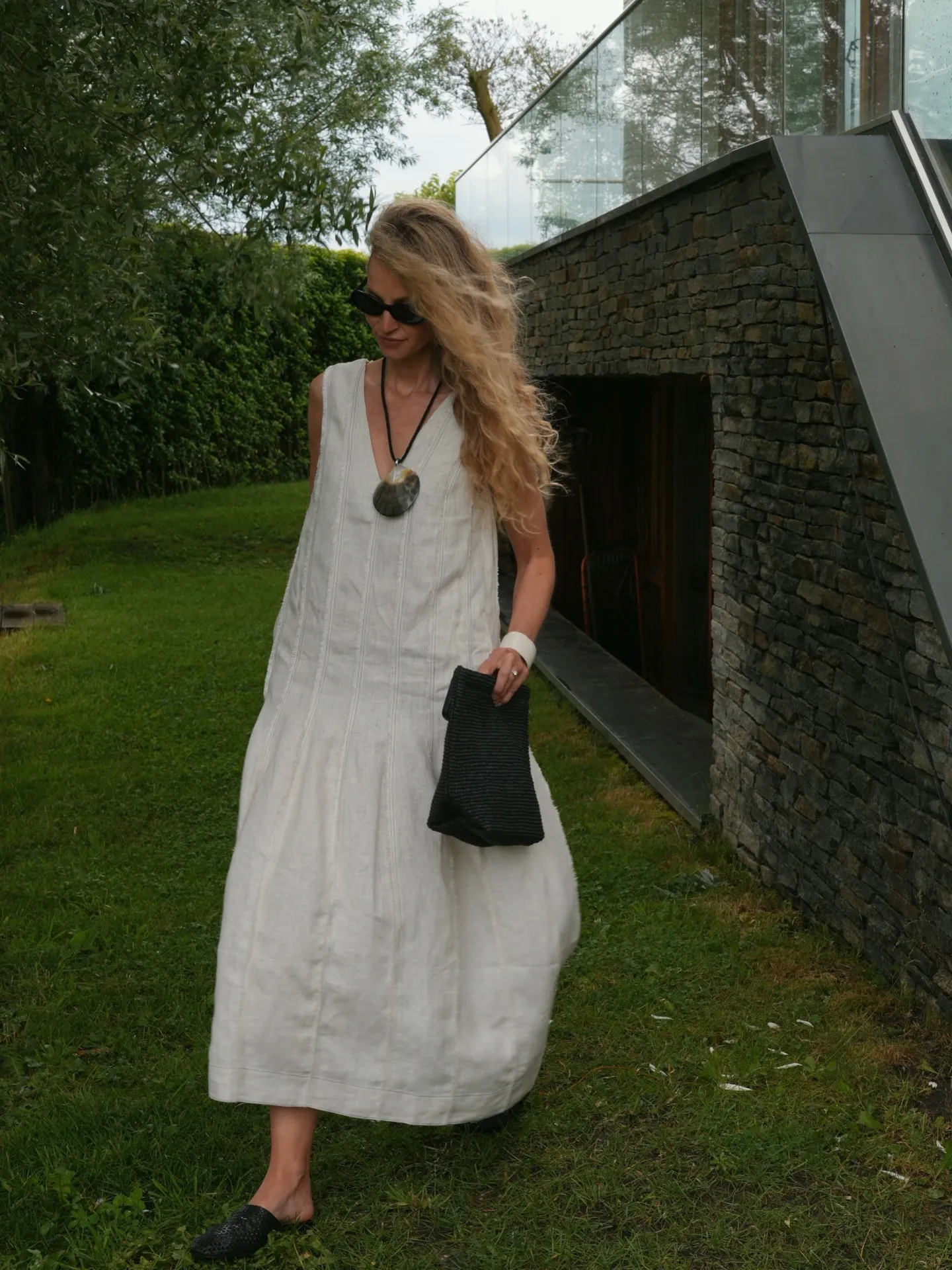 Anouk wearing white COS dress
