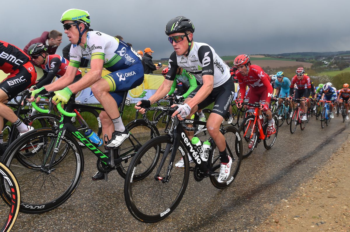 Serge Pauwels rides in the shadow of Mat Hayman
