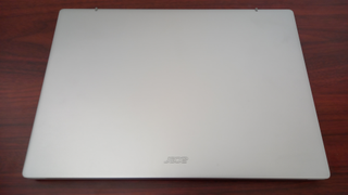 Top of Acer Swift Go 14 laptop on desk