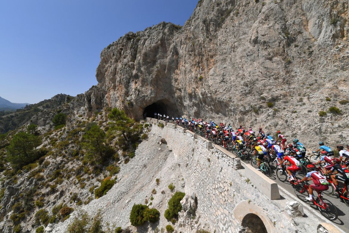 The peloton heads into the cliffs