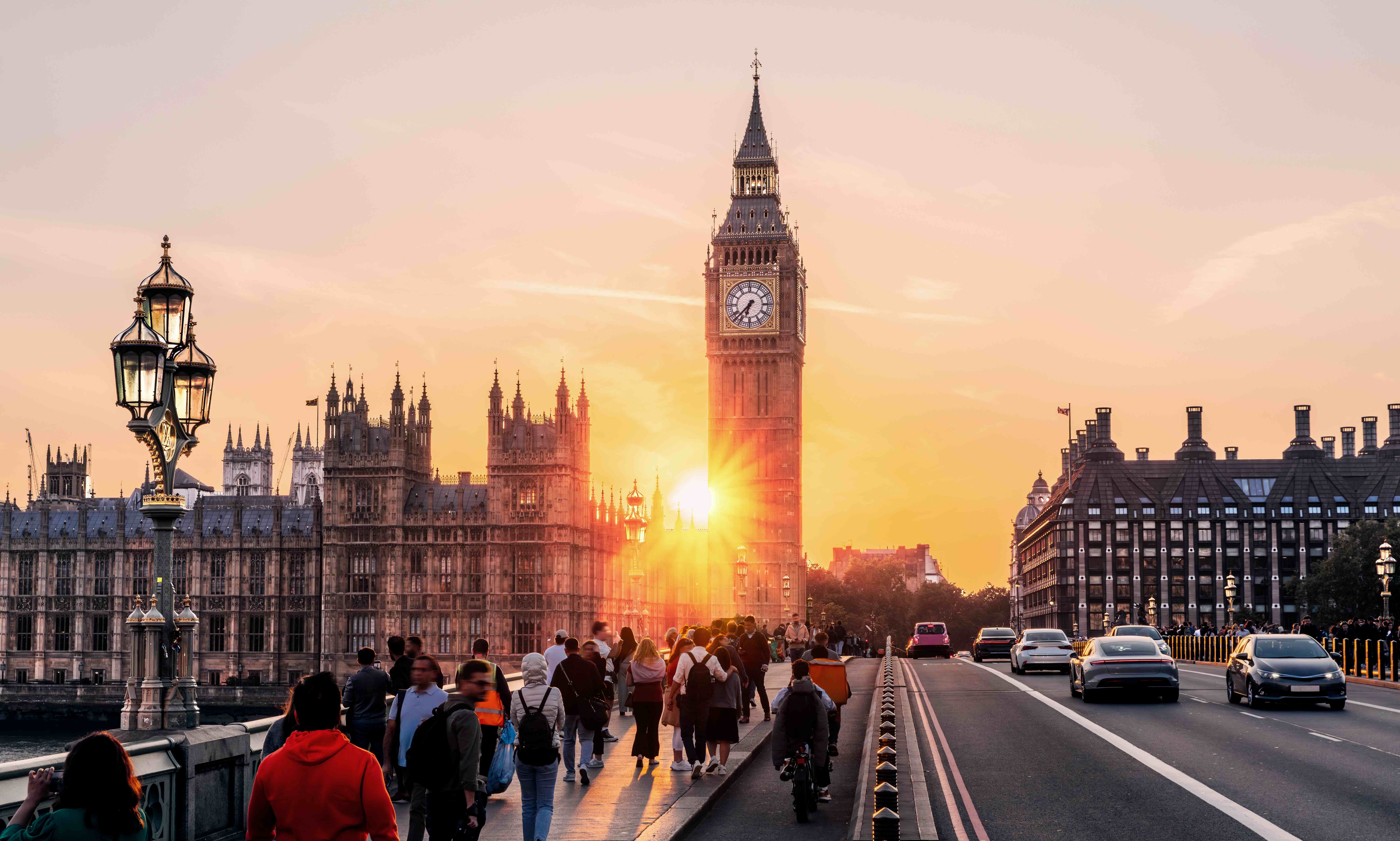 The sun shines over Big Ben on a warm summer's evening