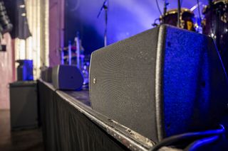 Four coaxial X8 enclosures serve as stage lip-fills