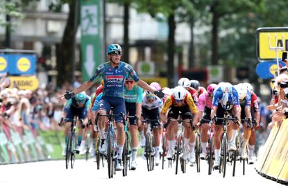 HAMBURG, GERMANY - AUGUST 16: (L-R) Paul Magnier of France and Team Soudal Quick-Step celebrates at finish line as race winner ahead of Milan Fretin of Belgium and Team Cofidis and Laurence Pithie of New Zealand and Team Red Bull - BORA - hansgrohe during the 29th ADAC Cyclassics Hamburg 2026 a 205.3km one day race from Buxtehude to Hamburg / #UCIWT / on August 16, 2026 in Hamburg, Germany. (Photo by Ronny Hartmann/Getty Images)