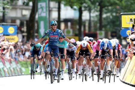 HAMBURG, GERMANY - AUGUST 16: (L-R) Paul Magnier of France and Team Soudal Quick-Step celebrates at finish line as race winner ahead of Milan Fretin of Belgium and Team Cofidis and Laurence Pithie of New Zealand and Team Red Bull - BORA - hansgrohe during the 29th ADAC Cyclassics Hamburg 2026 a 205.3km one day race from Buxtehude to Hamburg / #UCIWT / on August 16, 2026 in Hamburg, Germany. (Photo by Ronny Hartmann/Getty Images)