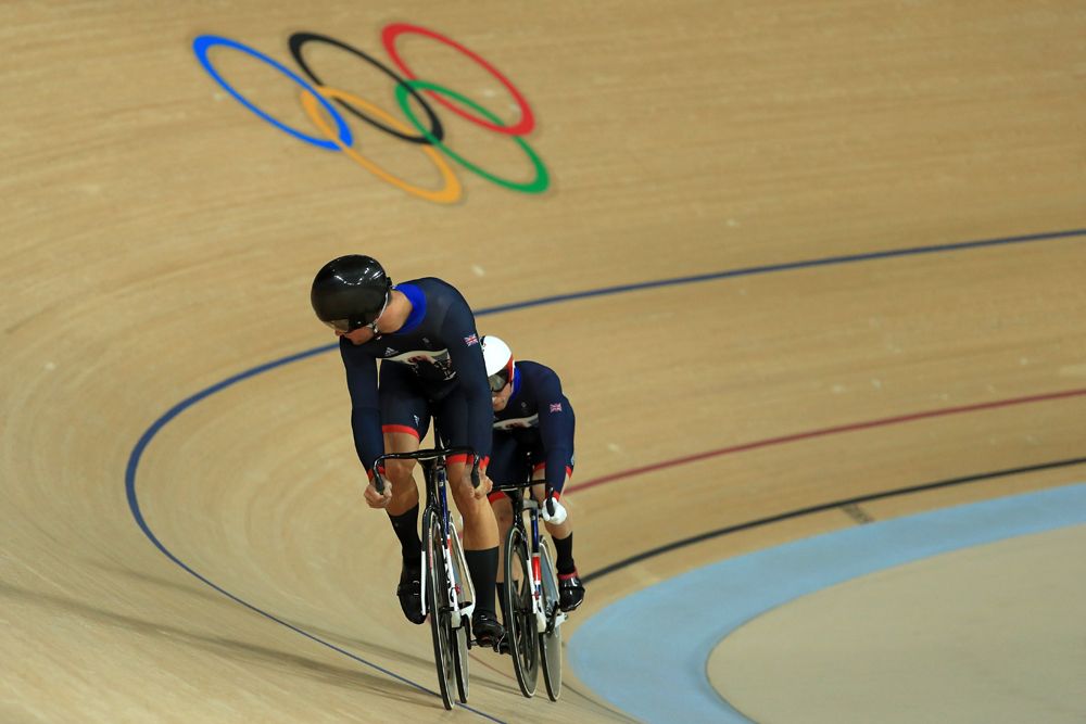 Callum Skinner leads Jason Kenny in the gold medal ride, heat 1