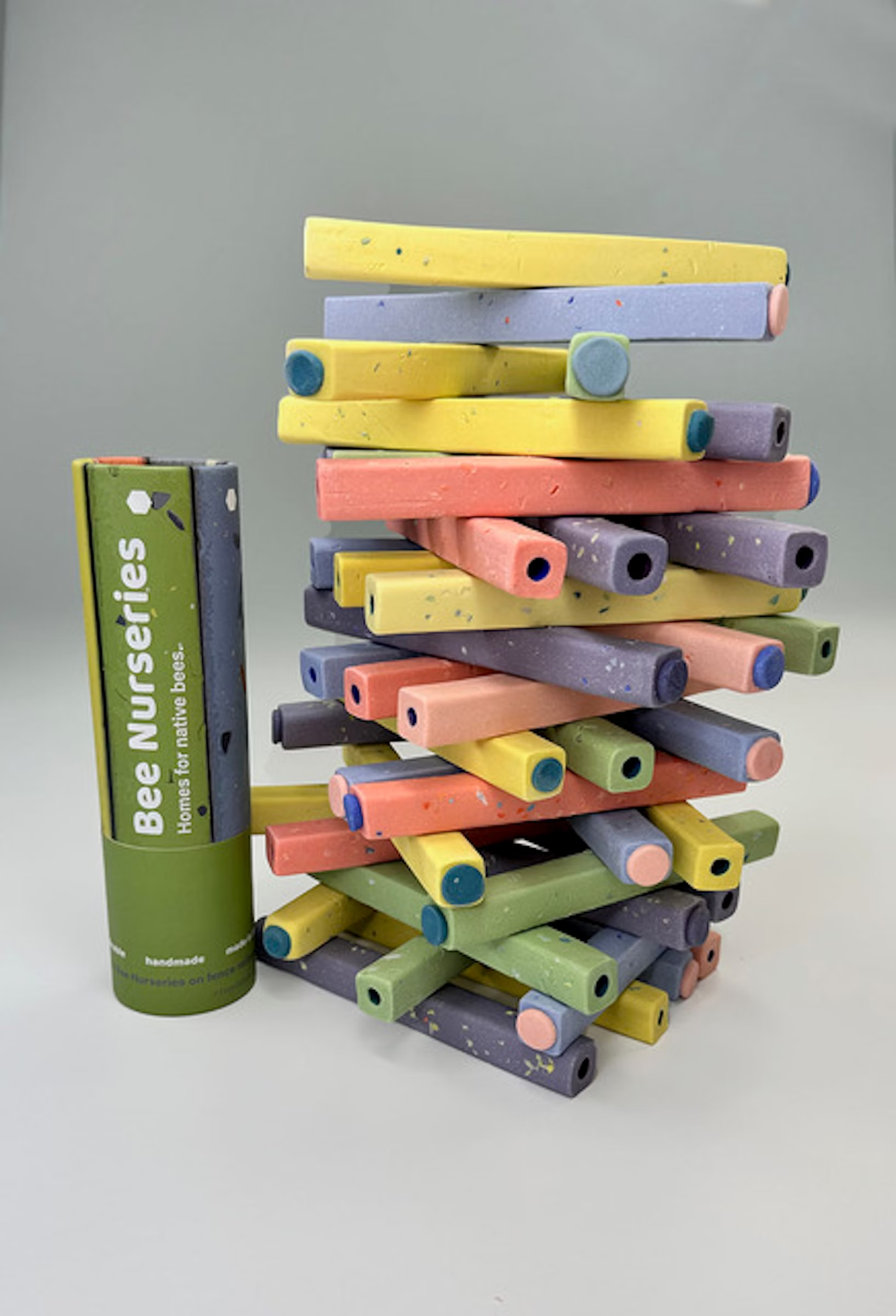 Stack of ceramic bee nursery tubes