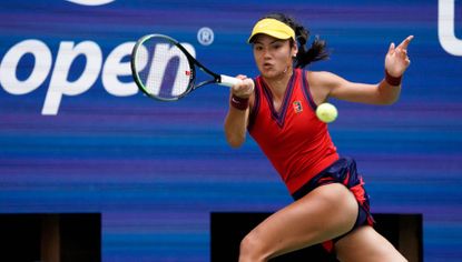 Britain's Emma Raducanu hits a return to US player Shelby Rogers during their 2021 US Open Tennis tournament women's singles fourth round match at the USTA Billie Jean King National Tennis Center in New York, on September 6, 2021.