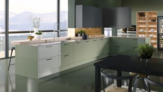 contemporary green kitchen with peninsula