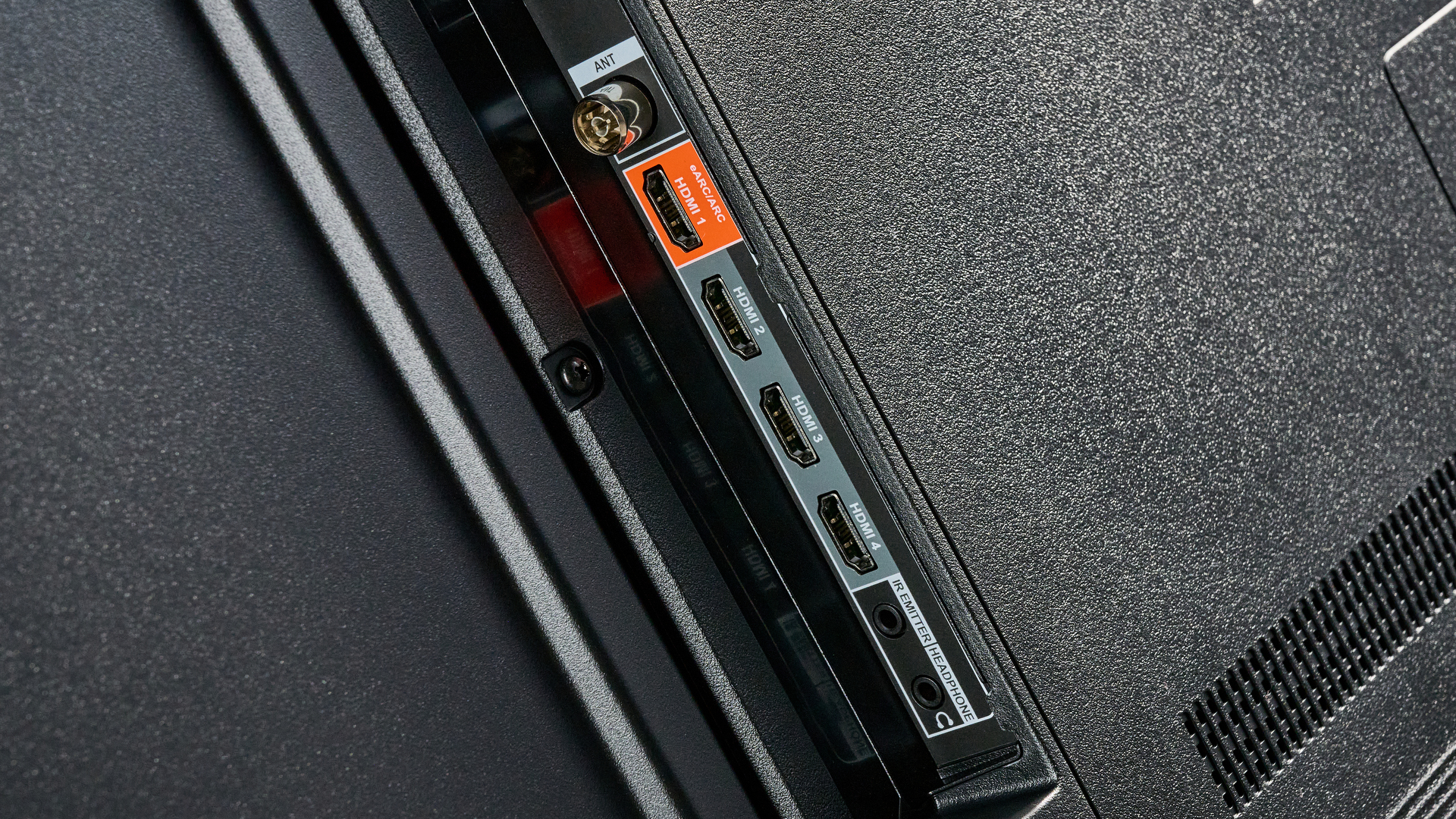 the amazon ember 4-series TV photographed against the blue tom's guide background