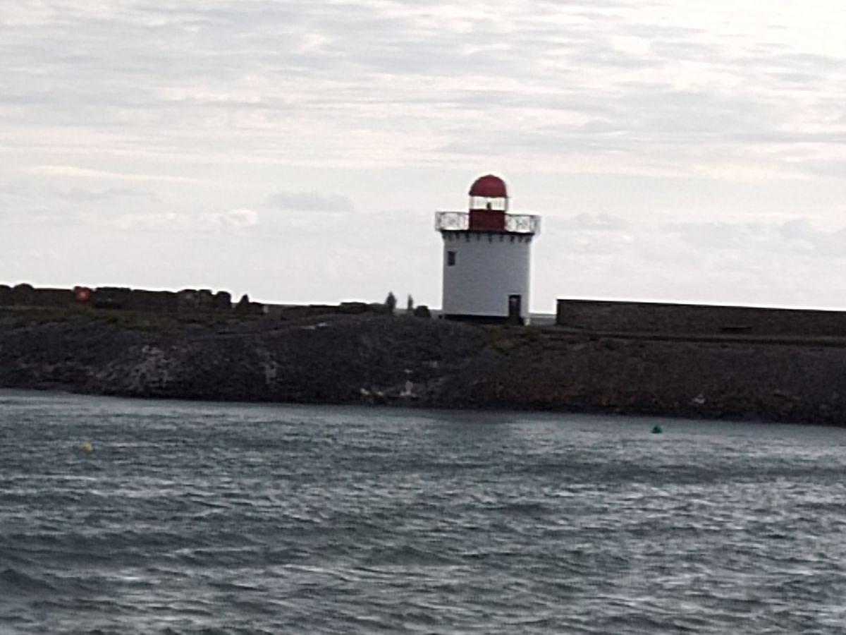 An Honor Magic 4 Lite camera sample showing a lighthouse