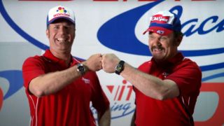 Will Ferrell and John C. Reilly happily fist bump in Talladega Nights: The Ballad of Ricky Bobby.