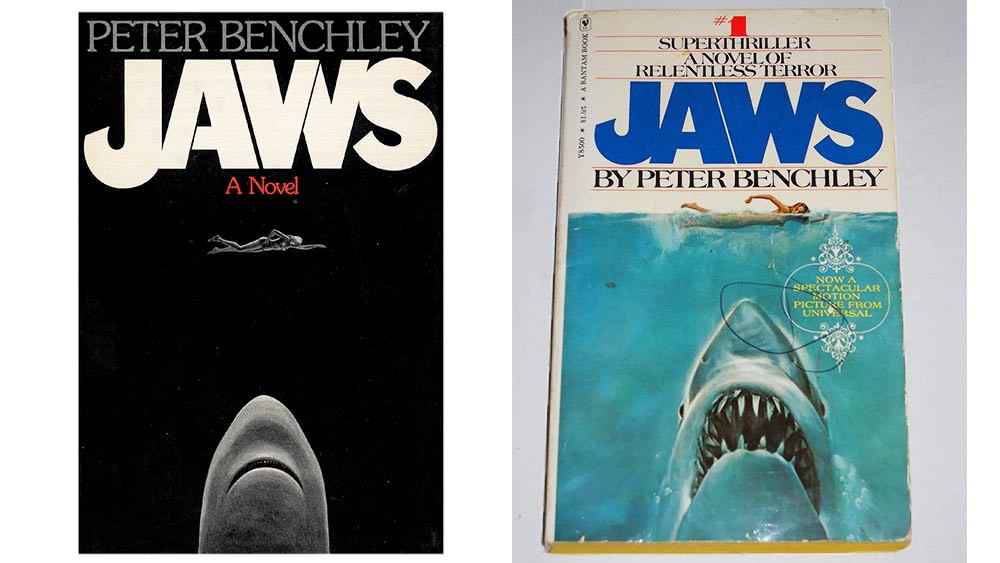 The original Jaws book cover and the paperback cover showing a shark rising towards a swimmer