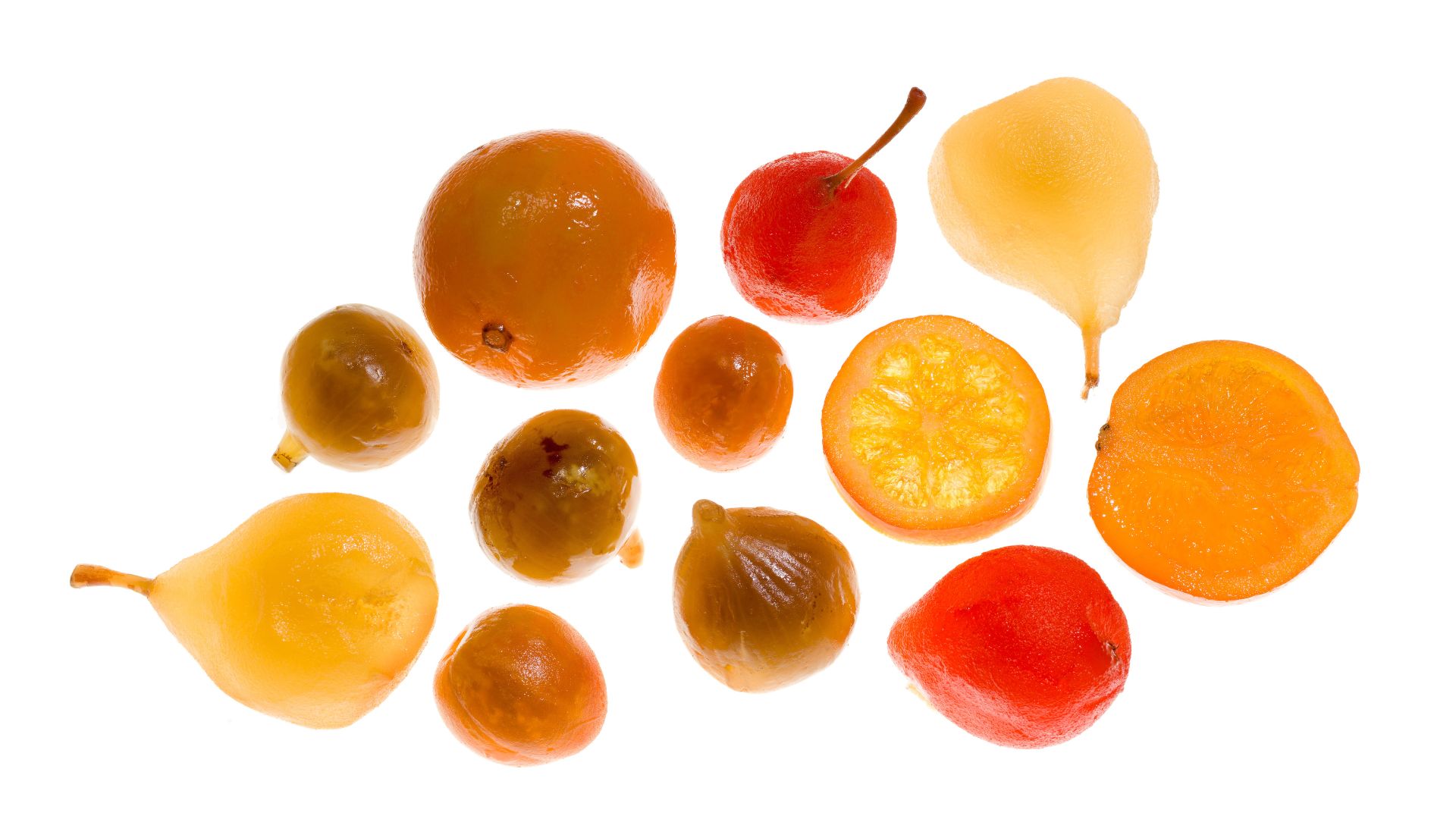 An overhead image of candied whole fruits