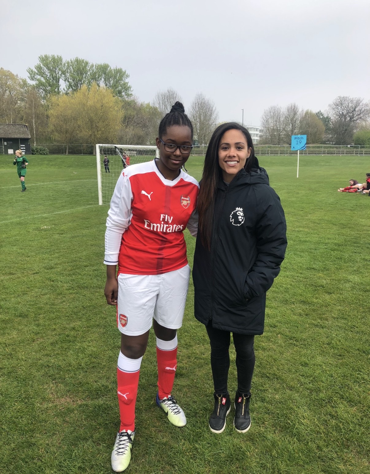 Mya and Alex Scott on the pitch
