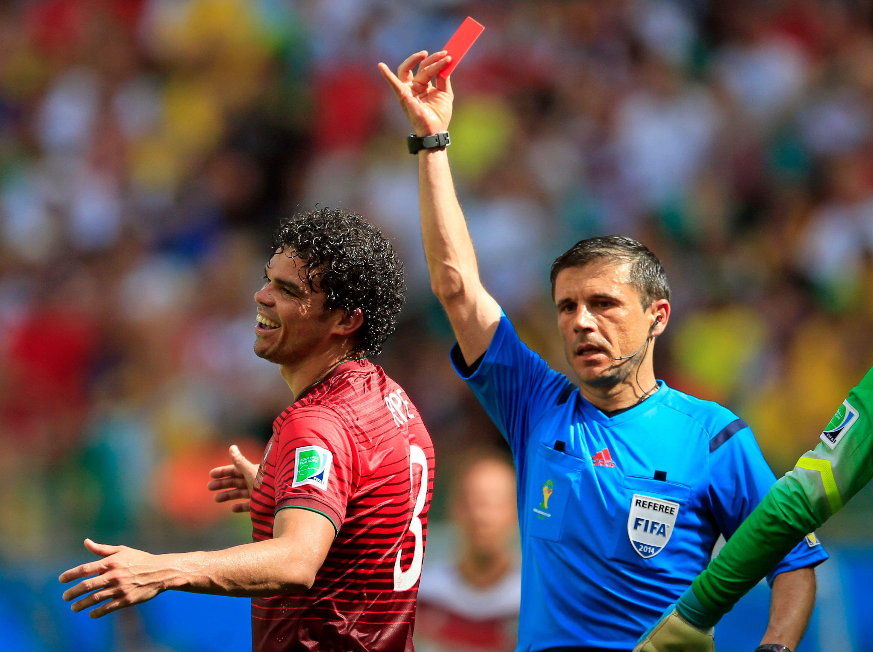 Pepe is sent off while playing for Portugal against Serbia at the 2014 World Cup