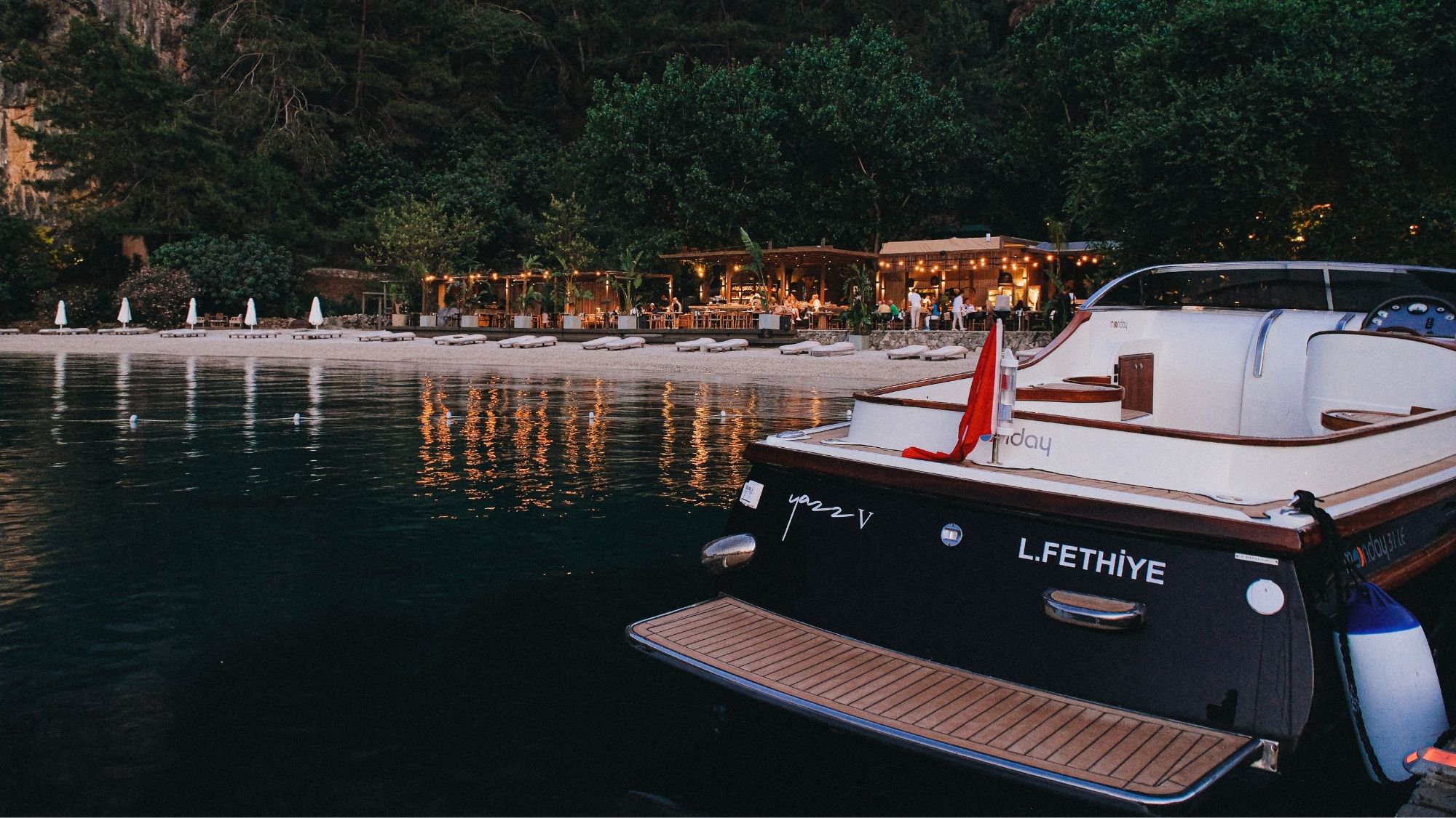 Yazz Collective on T&amp;uuml;rkiye&amp;rsquo;s Turquoise Coast, surrounded by lush greenery and the Mediterranean Sea.