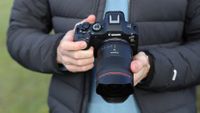 Canon EOS R6 Mark III camera with Canon RF 14mm f/1.4L VCM lens attached held in a pair of hands
