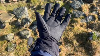 Hiker's hand wearing the Highlander Mountain Glove