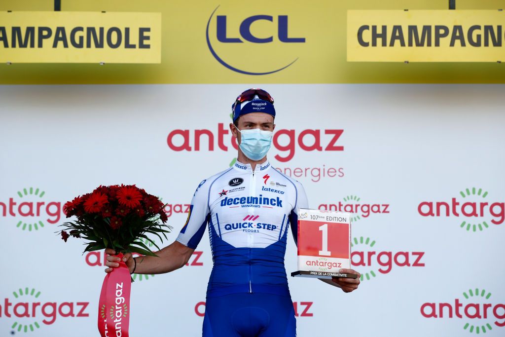 CHAMPAGNOLE FRANCE SEPTEMBER 18 Podium Remi Cavagna of France and Team Deceuninck QuickStep Celebration Trophy Flowers Mask Covid safety measures during 107th Tour de France 2020 Stage 19 a 1665km stage from Bourg en Bresse to Champagnole 547m TDF2020 LeTour on September 18 2020 in Champagnole France Photo by Benoit Tessier PoolGetty Images