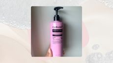 Image of hand holding pink bottle of Medicube's Rosemary PDRN Shampoo on a pale pink background with foam details