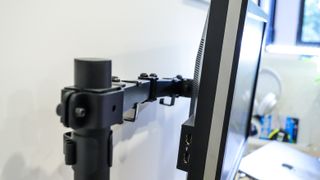 The monitor arm that's an optional accessory with the EverDesk Max