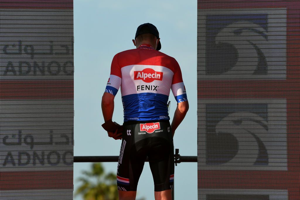 ABU DHABI UNITED ARAB EMIRATES FEBRUARY 21 Podium Mathieu van der Poel of The Netherlands and Team AlpecinFenix Celebration during the 3rd UAE Tour 2021 Stage 1 a 176km stage from Al Dhafra Castle to Al Mirfa Trophy Mask Covid Safety Measures UAETour on February 21 2021 in Abu Dhabi United Arab Emirates Photo by Tim de WaeleGetty Images