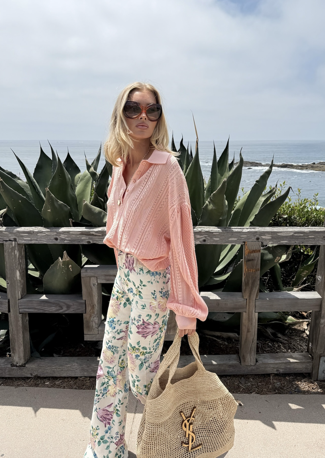 Elsa Hosk wearing a raffia bag