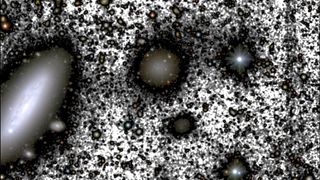 The galaxy DF4 (center). was originally a big problem for dark matter researchers, having little dark matter at all. But in 2020 astronomers cracked its mystery.