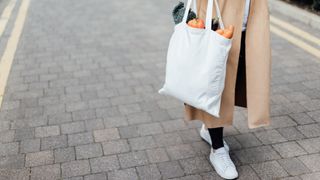 Woman carrying groceries