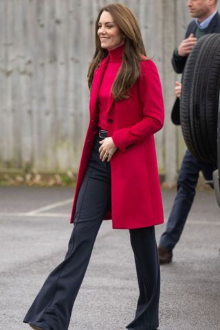 kate middleton wearing a bright pink coat and gold earrings on a royal engagement - kate middleton earrings