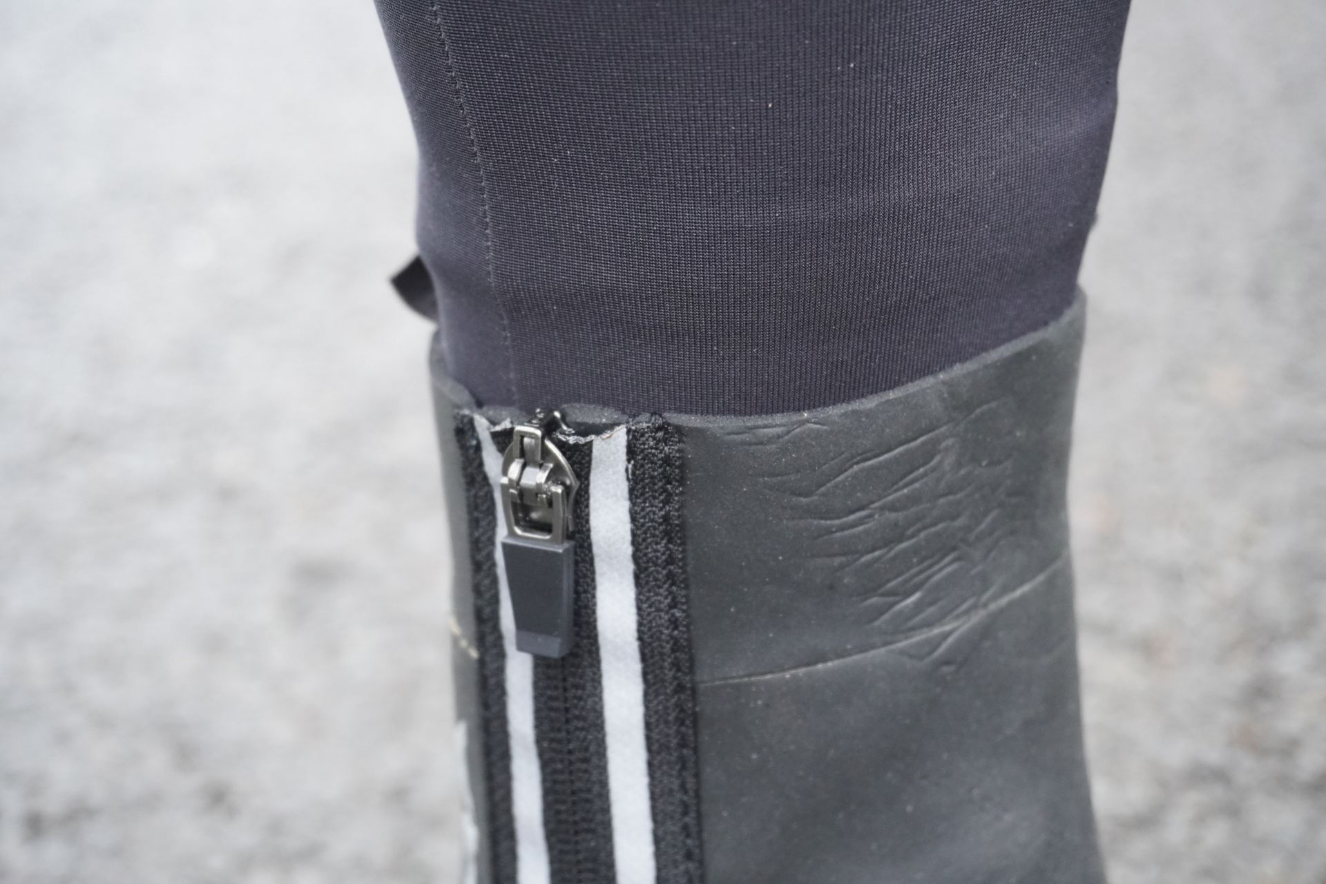 Image shows a rider wearing Endura's Freezing Point Overshoe IIs.