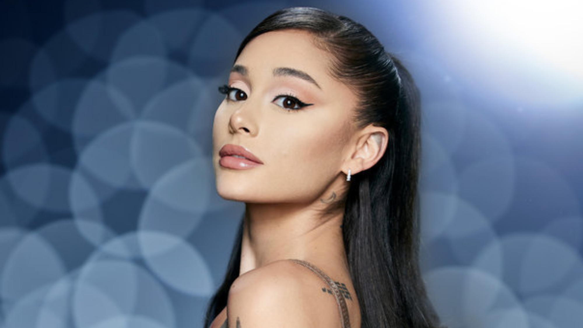 Ariana Grande is shown in a press image for The Voice.