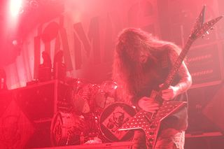 Dimebag Darrell performs onstage with Damageplan at the House of Blues in Chicago, Illinois on April 8, 2004