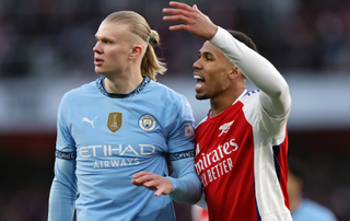 Erling Haaland of Manchester City and Gabriel Magalhaes of Arsenal during the Premier League match between Arsenal FC and Manchester City FC at Emirates Stadium on February 02, 2025 in London, England. 