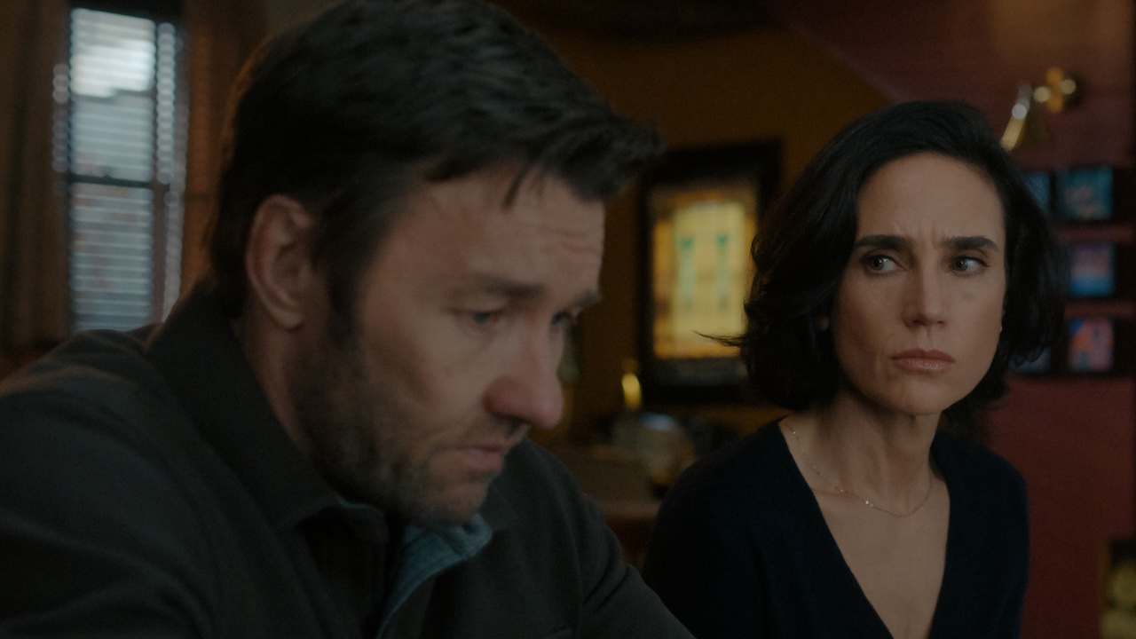 Joel Edgerton sitting next to Jennifer Connelly In Dark Matter
