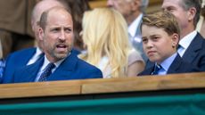 Prince William and Prince George sit in the Royal Box for the Gentlemen's Singles Final during the Wimbledon Lawn Tennis Championships 2025