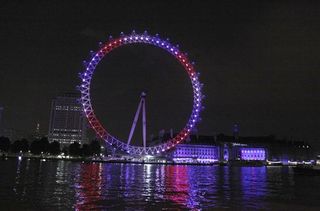 The London Eye lit in red, white and blue to celebrate the birth of the royal baby boy