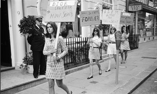 women in the 1960s protesting for the mini skirt