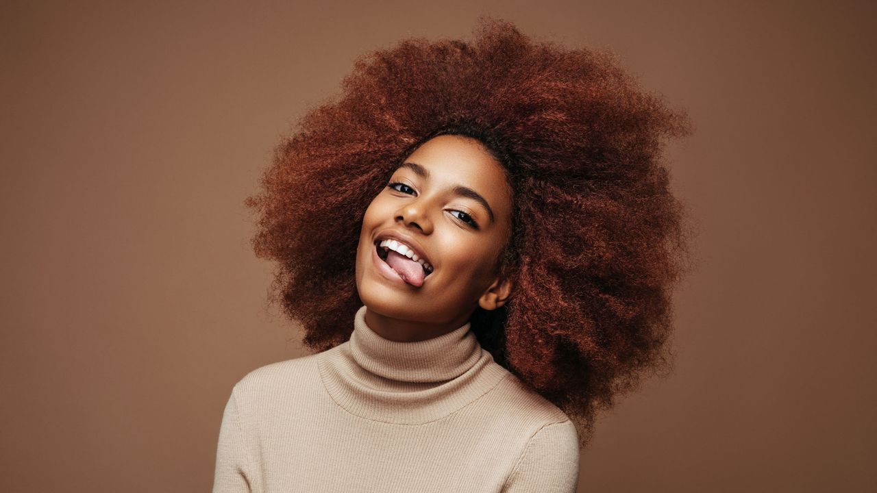 Woman with curly coily hair