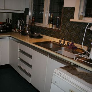 kitchen room with printed wall and sink