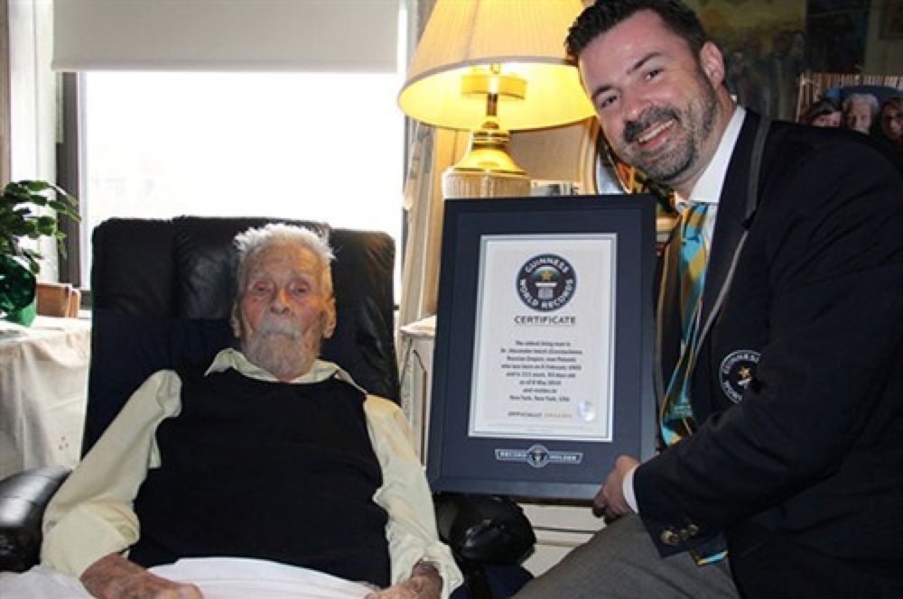 Dr. Alexander Imich, 111, crowned the new world&#039;s oldest living man,with Guinness World Records official Stuart Claxton.