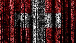 Flag of Switzerland on a computer binary codes falling from the top and fading away.