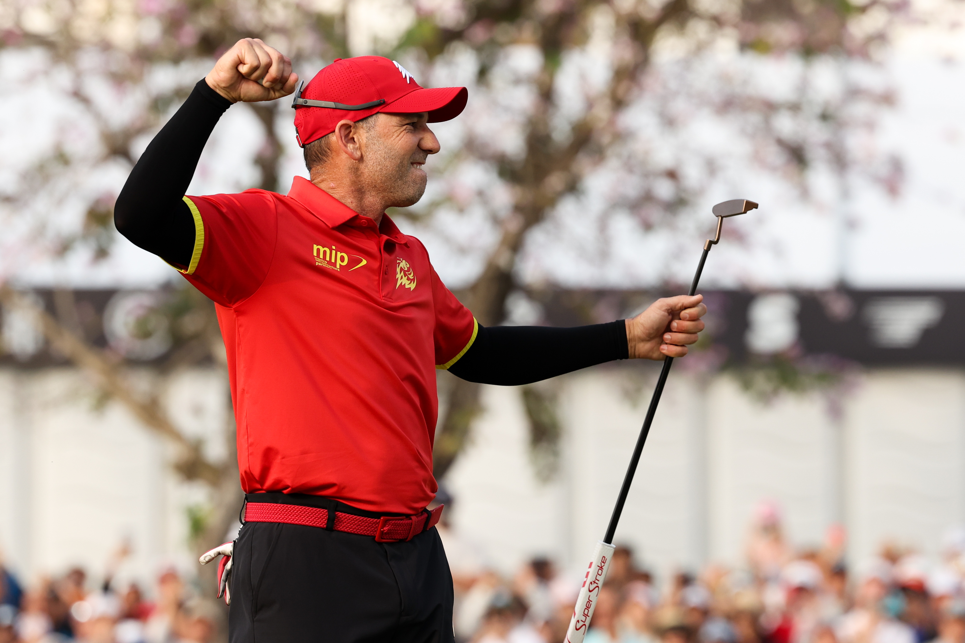 Sergio Garcia celebrates after holing a putt