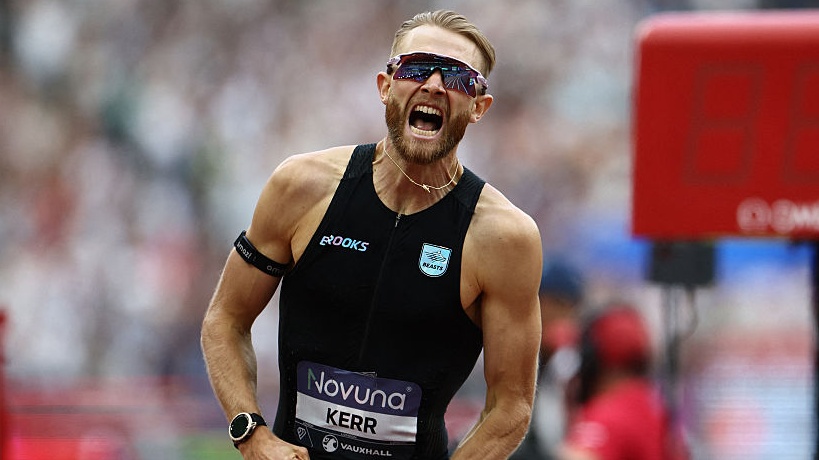 Britain's Josh Kerr celebrates after winning the men's one mile event during the IAAF Diamond League athletics competition at the London stadium in London on July 18, 2026. 