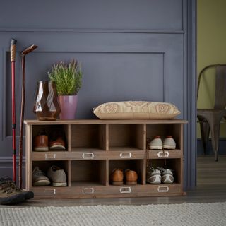 Storage bench seat with open cubbies for shoe storage
