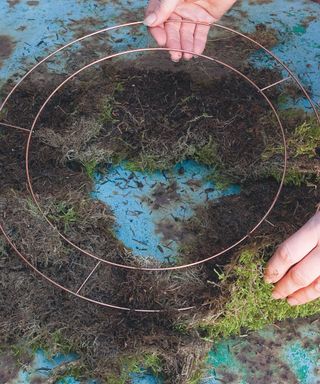 wire wreath base with moss